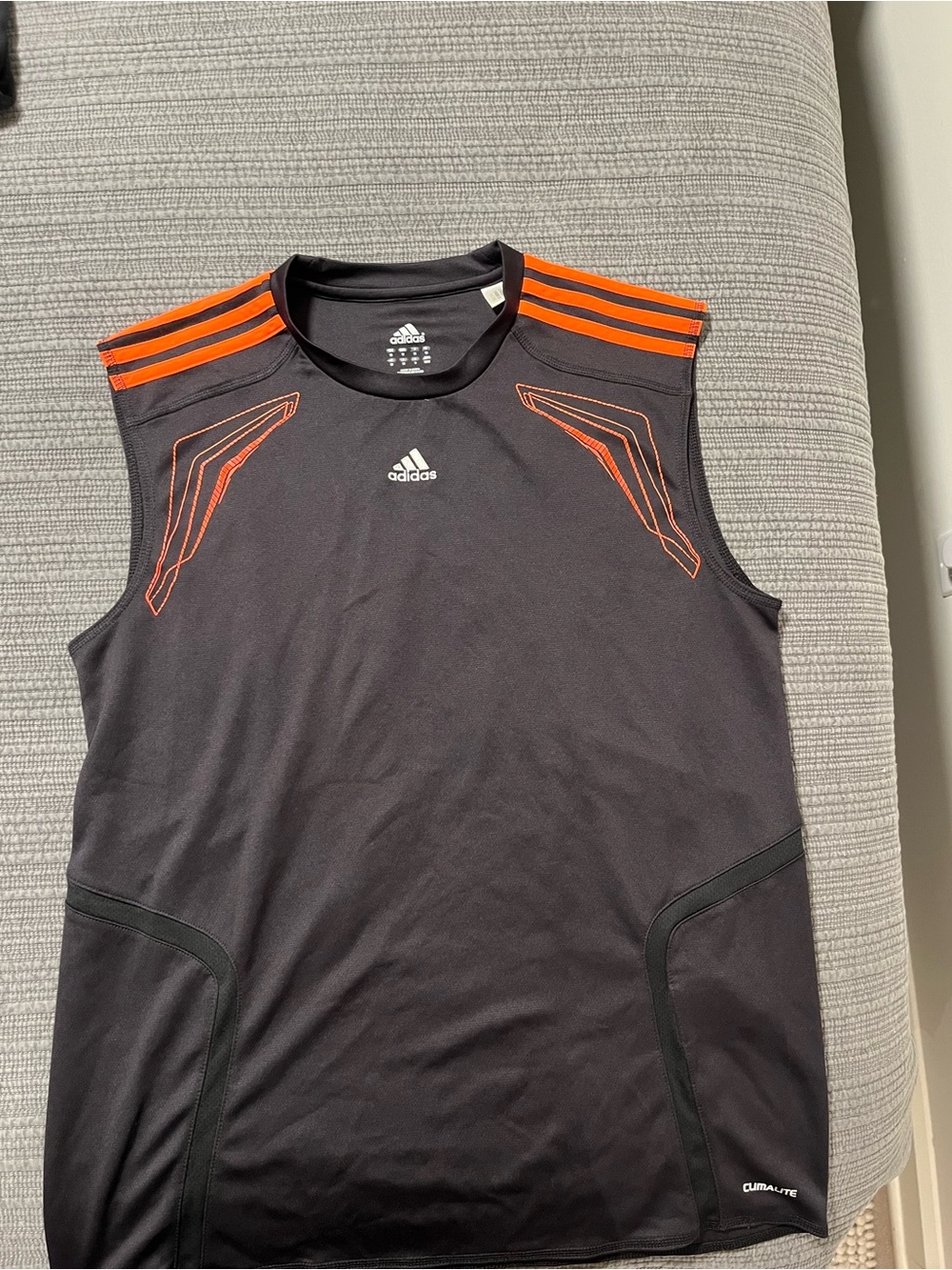 adidas Men’s Black Sleeveless Training Tank with Orange Accents